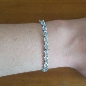 Adjustable silver and aquamarine bracelet